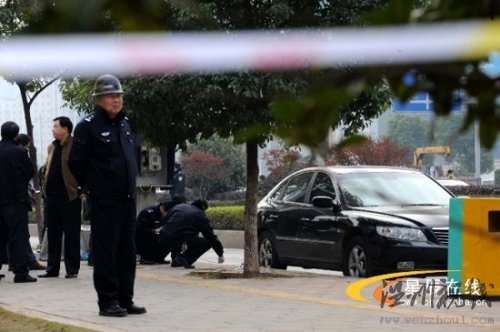 男子在銀行取錢后被當(dāng)街槍殺(組圖)